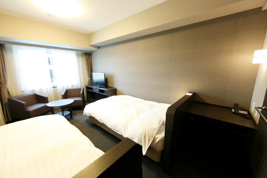 Dormy Inn Каґошіма Номер фото