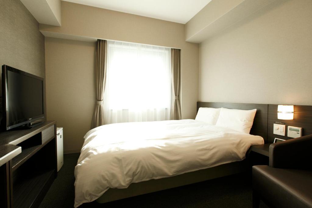 Dormy Inn Каґошіма Номер фото